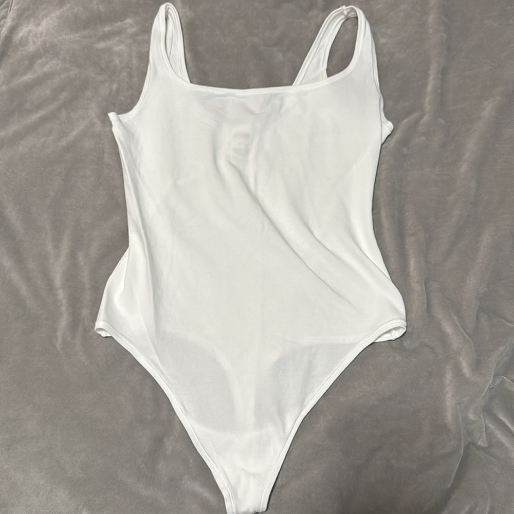 ‘PINK’ White Body Suit